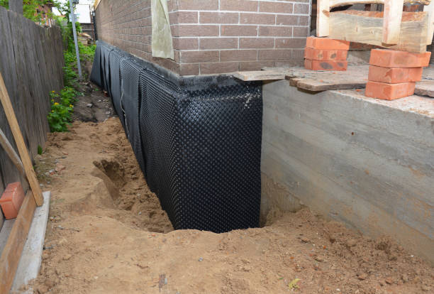SJ Waterproofing Pros technician performing targeted Foundation Crack Repair assessment in Charlottesville, IN